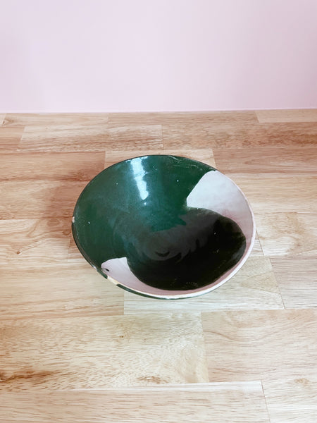 green and white glazed ceramic bowl