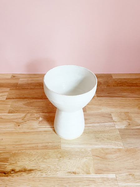 white tall pedestal bowl with white matte glaze