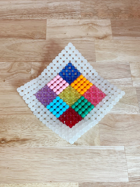 beaded object in multicolored arrangement